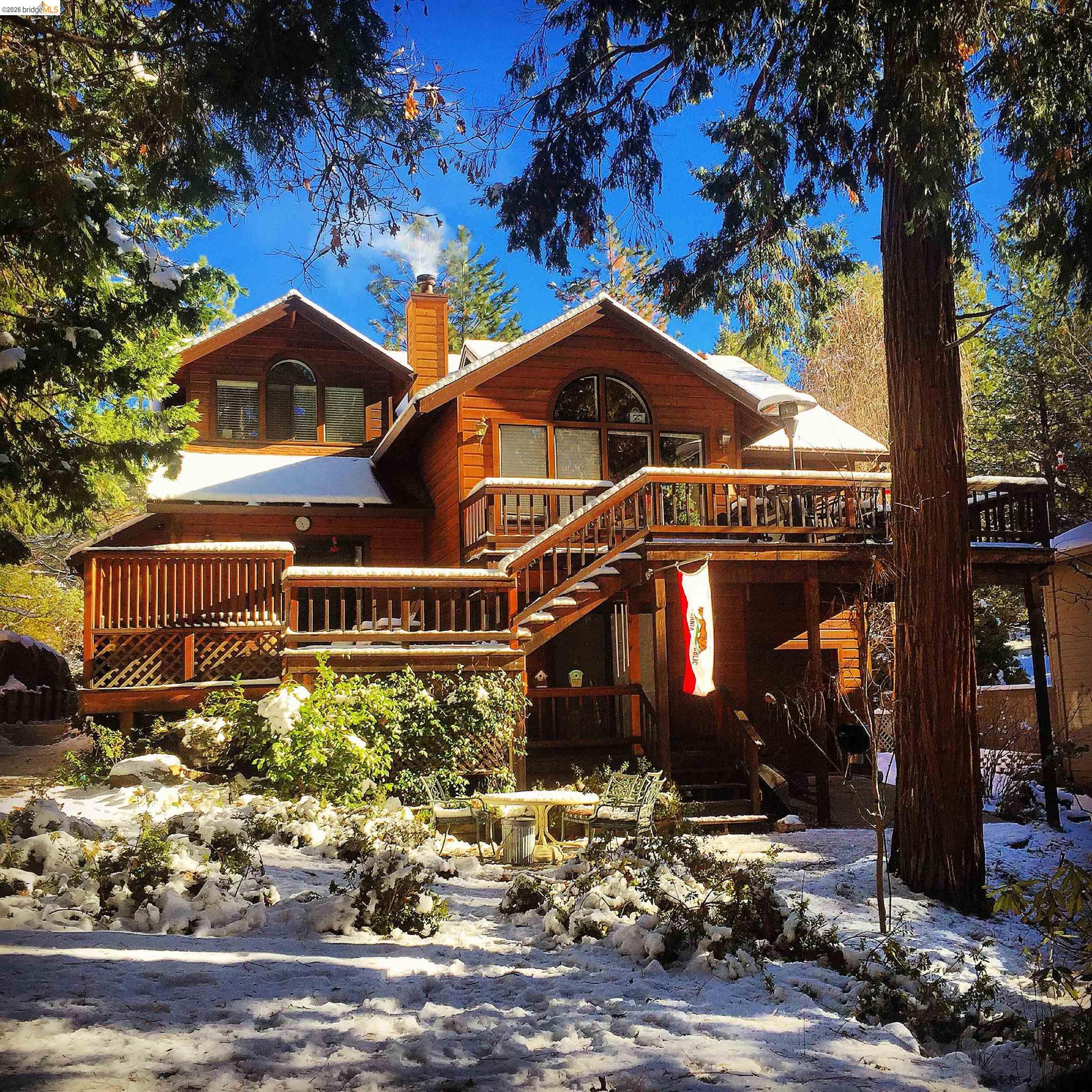 1554 Vine Maple Drive Murphys, CA 95247 - Photo 42 of 54 a front view of a house with a yard