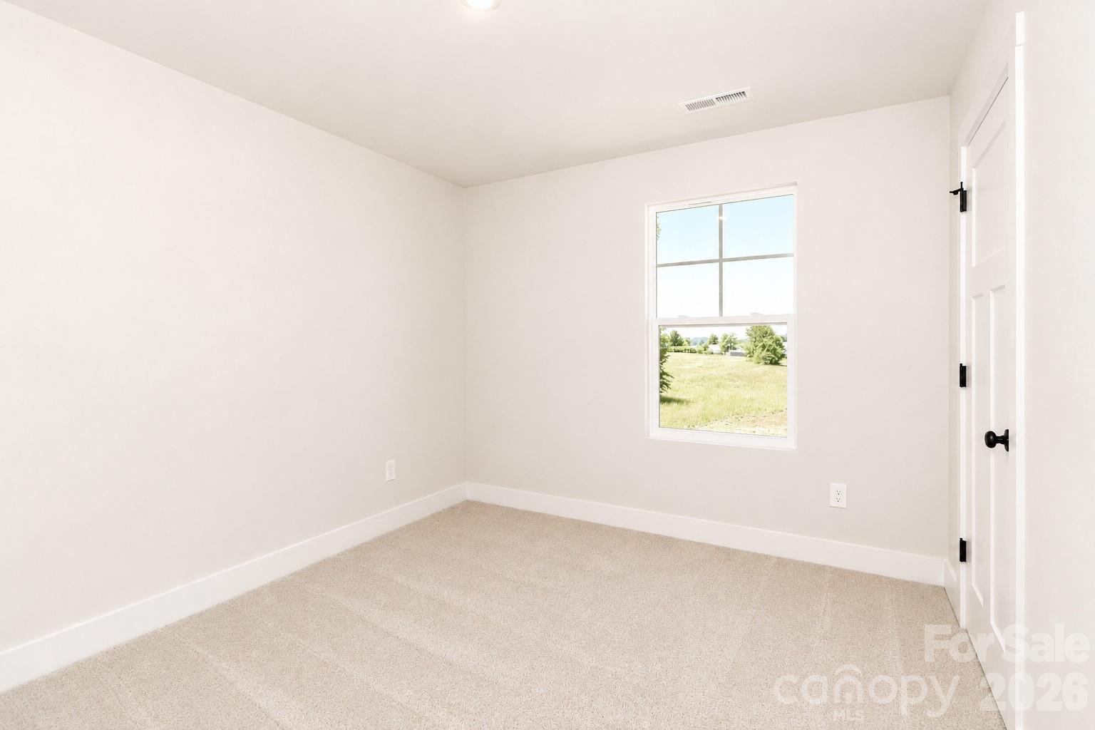 237 3rd Creek Road Stony Point, NC 28678 - Photo 24 of 29 an empty room with a window