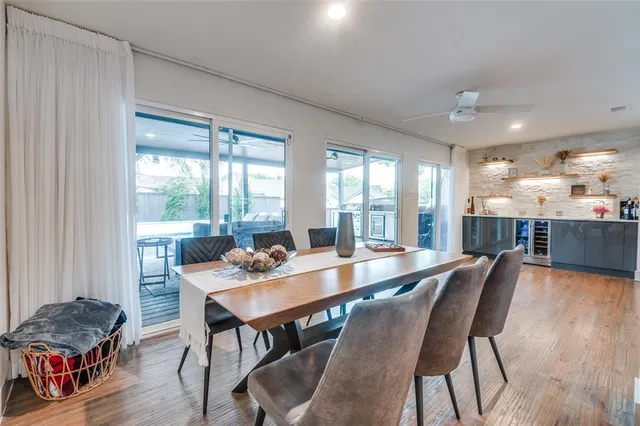 a kitchen with stainless steel appliances a stove a sink and a microwave