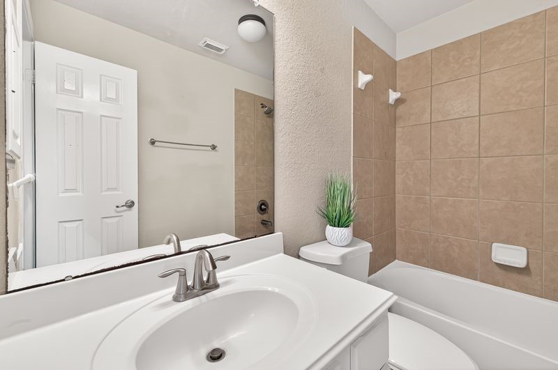 111 South Rocky Point Circle Spring, TX 77389 - Photo 29 of 41 a bathroom with a sink and a bathtub