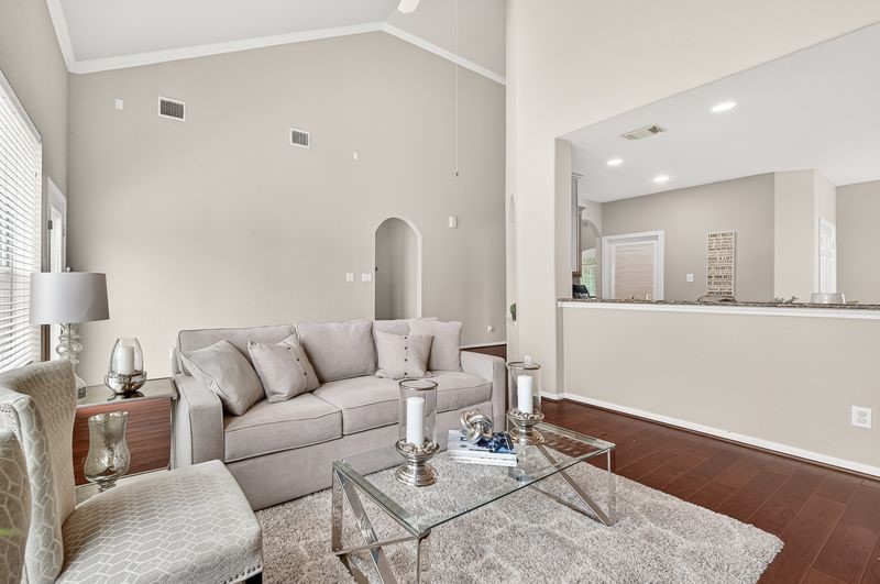 111 South Rocky Point Circle Spring, TX 77389 - Photo 10 of 41 a living room with furniture and a wooden floor