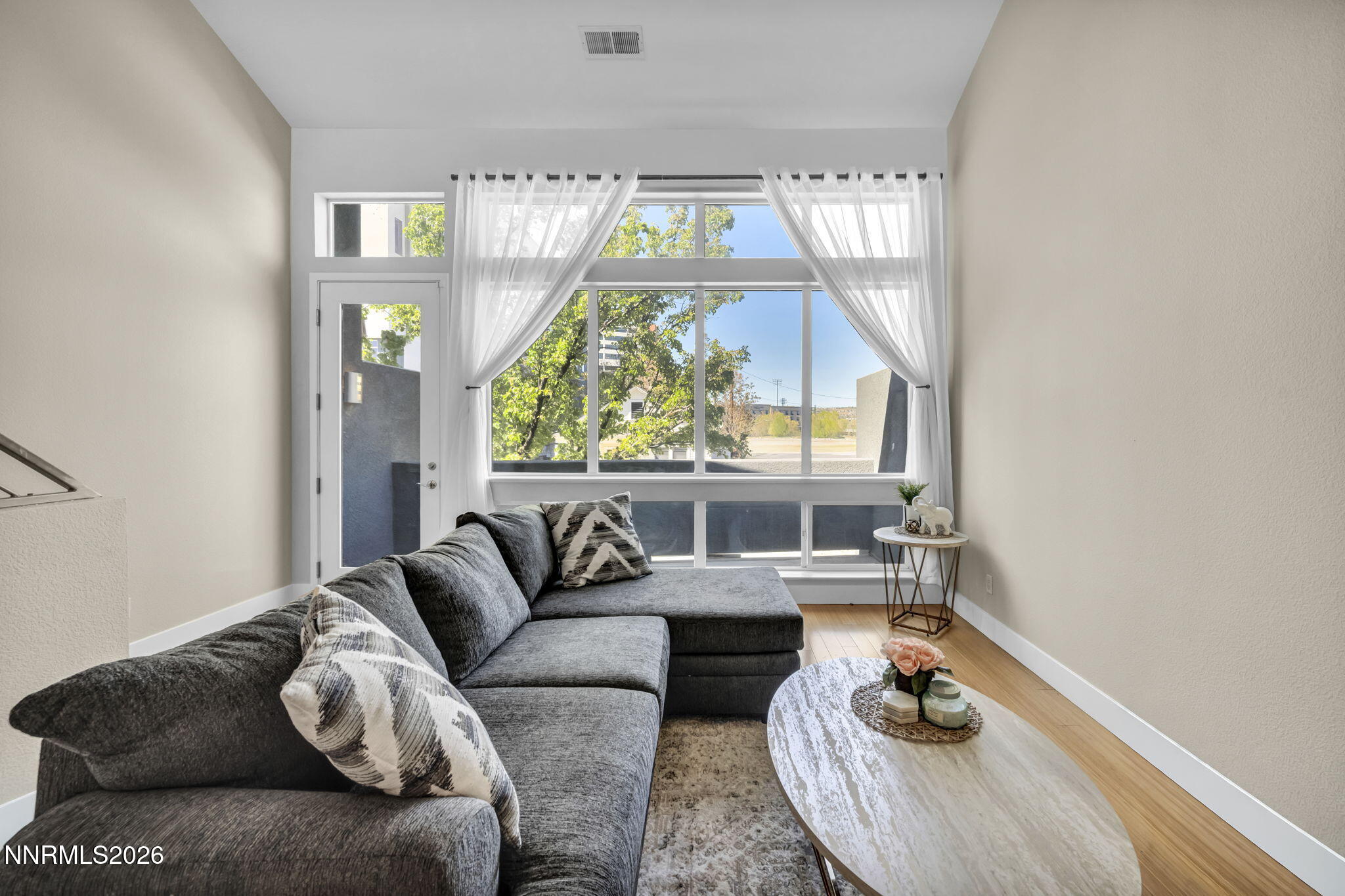 326 State Street Reno, NV 89501 - Photo 35 of 49 a living room with furniture and a large window