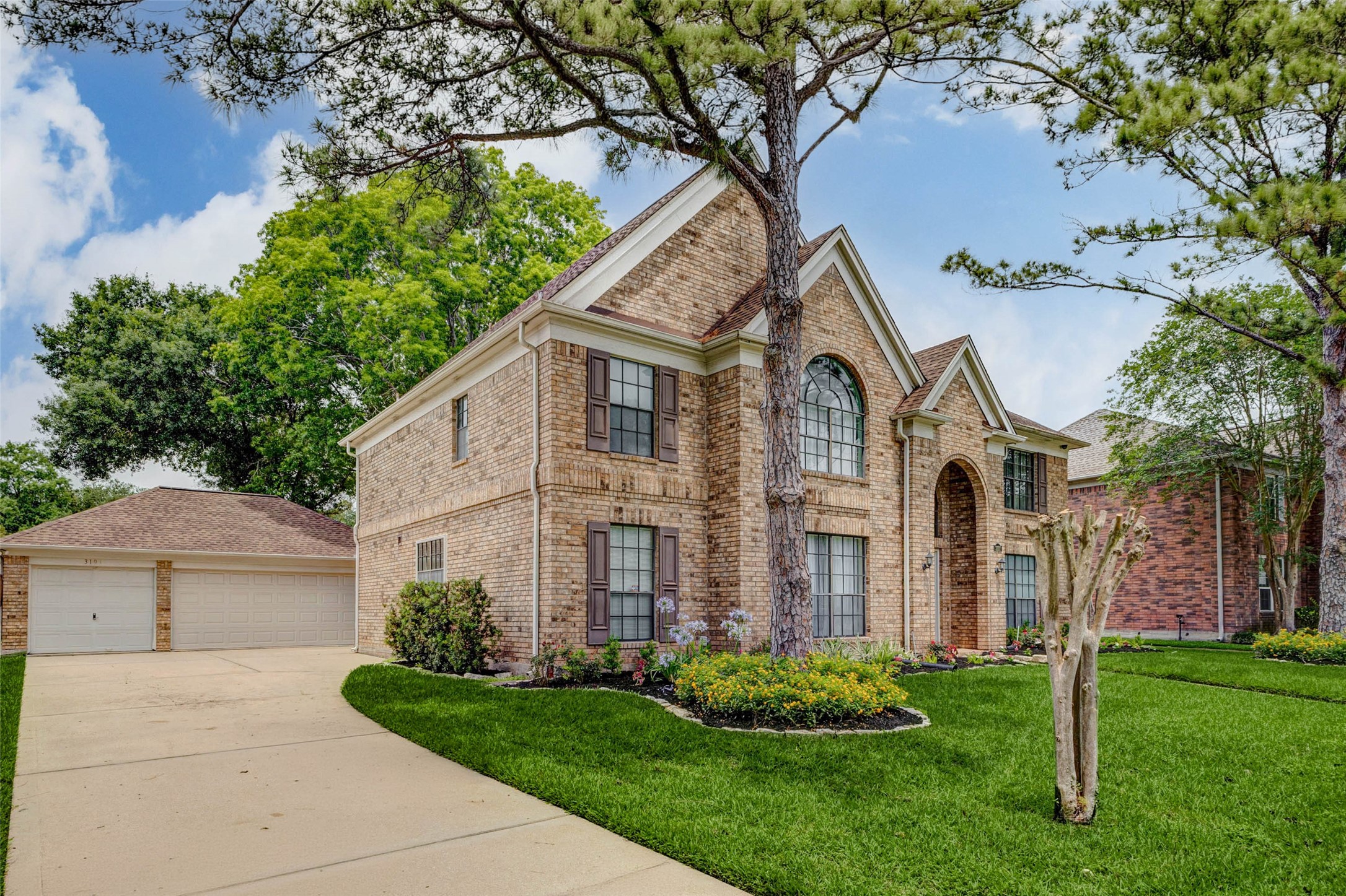 3107 Dulaney Road Houston, TX 77084 - Photo 3 of 50 a front view of a house with garden