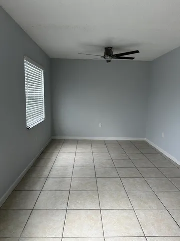 a view of a room that has a window in it