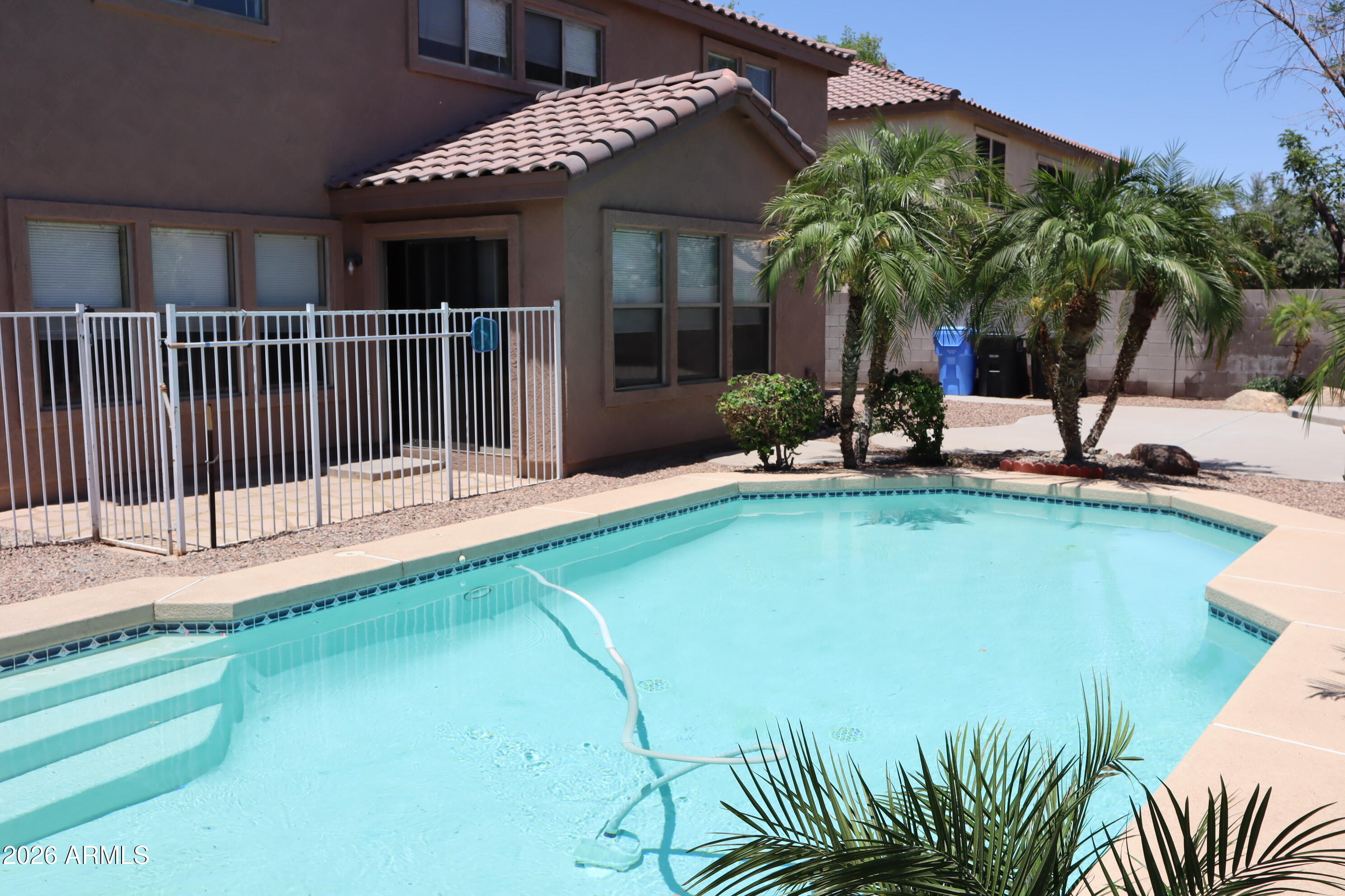 3281 South Martingale Road Gilbert, AZ 85297 - Photo 2 of 15 a view of a house with backyard and sitting area