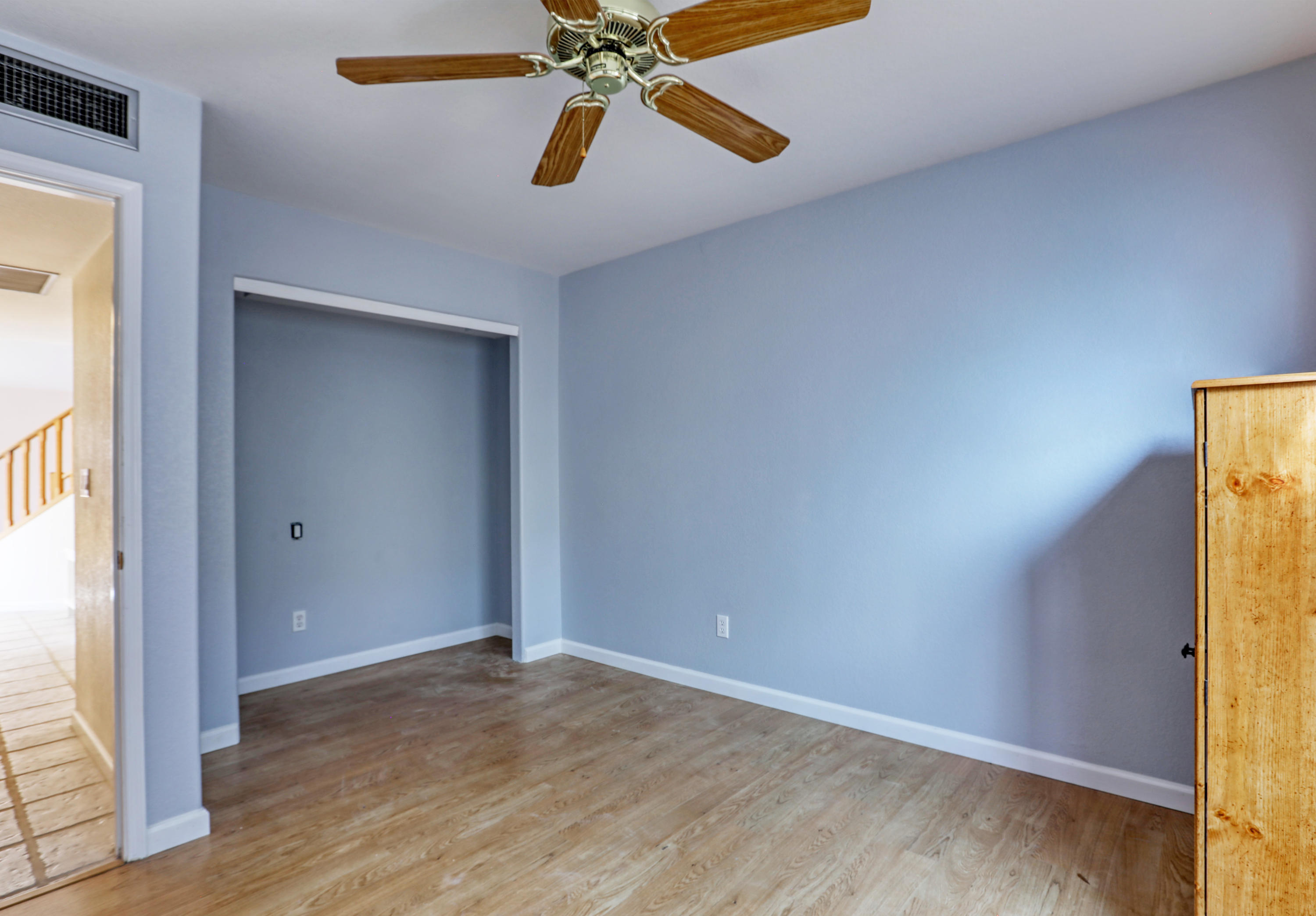 12560 North Wayfarer Way Oro Valley, AZ 85755 - Photo 39 of 43 wooden floor in an empty room with a window