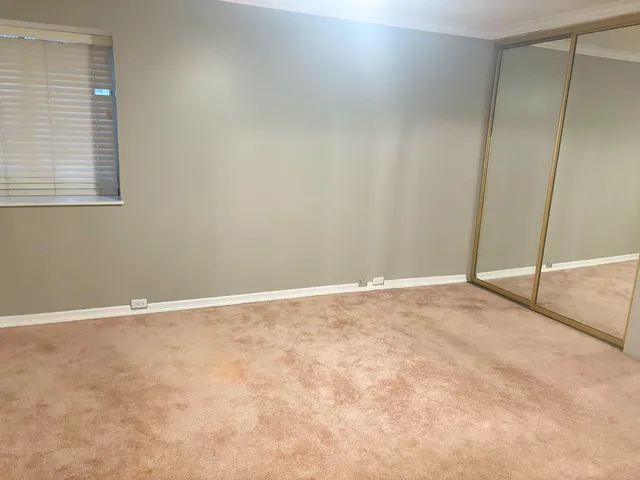 a view of an empty room with window