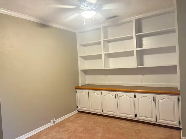 a view of a room with rack on the wall