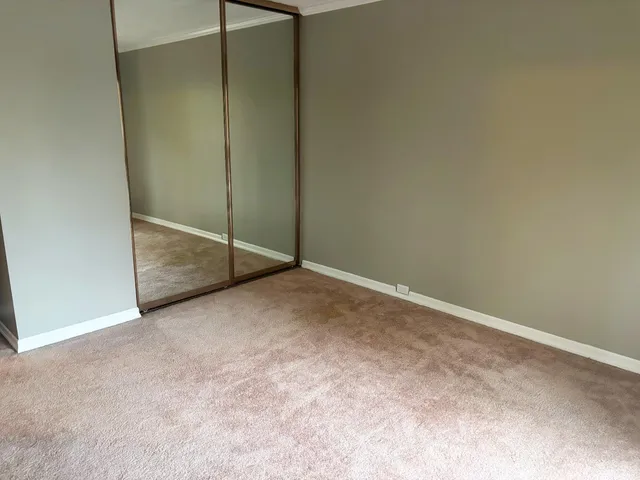 an empty room with an empty door