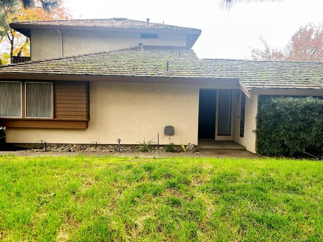 a view of a house with a swimming pool