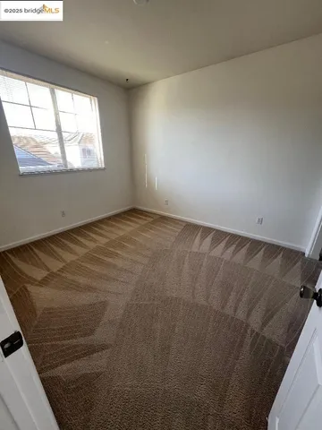a view of a livingroom with a window