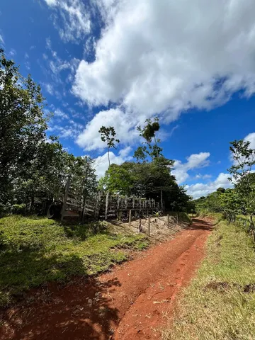 a backyard of a house with a yard and outdoor seating