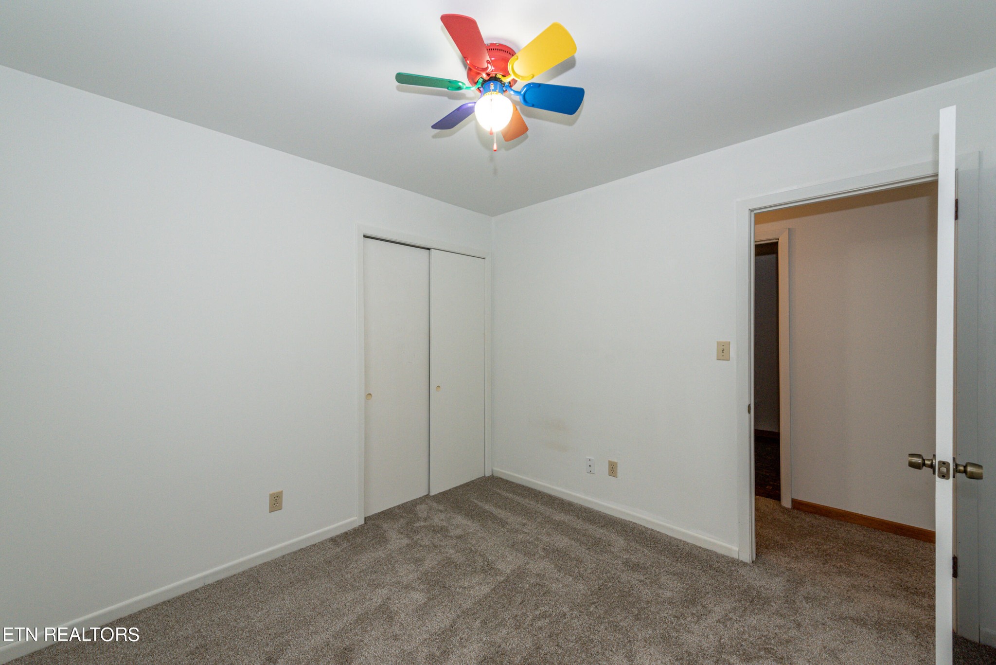 4038 Big Springs Ridge Road Friendsville, TN 37737 - Photo 13 of 26 a view of an empty room with a fan