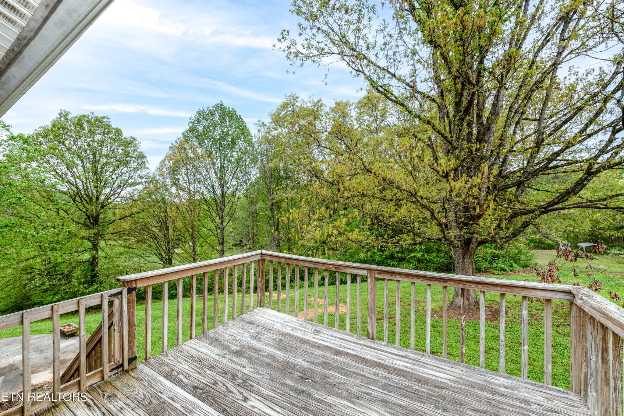 4038 Big Springs Ridge Road Friendsville, TN 37737 - Photo 24 of 26 a view of balcony with wooden fence and floor