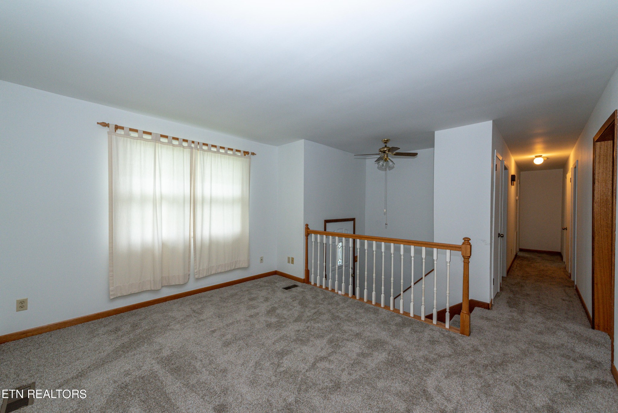 4038 Big Springs Ridge Road Friendsville, TN 37737 - Photo 6 of 26 an empty room with windows