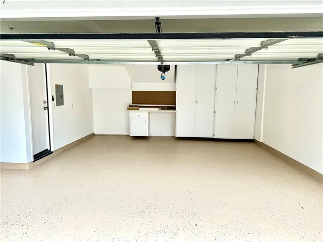 a swimming pool with outdoor seating and yard