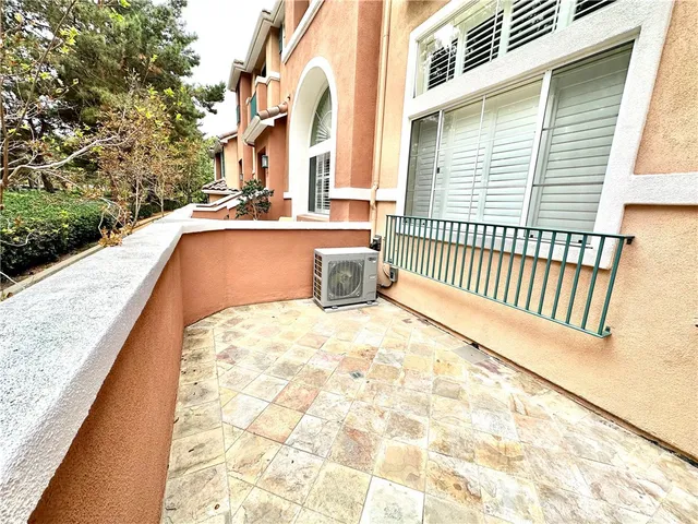 a view of terrace with wooden floor and fence