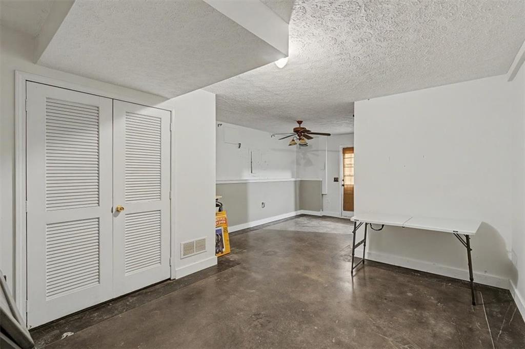 409 Windsor Way Canton, GA 30115 - Photo 29 of 51 an empty room with a empty space