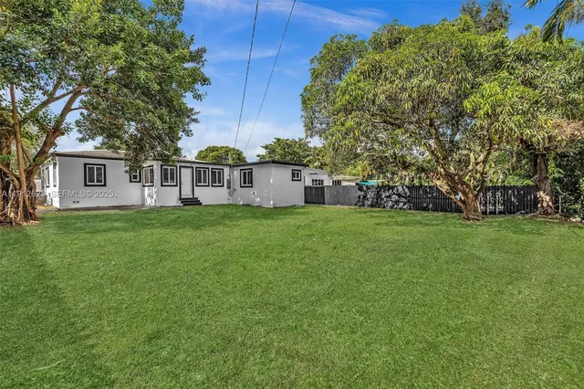 a house view with garden space