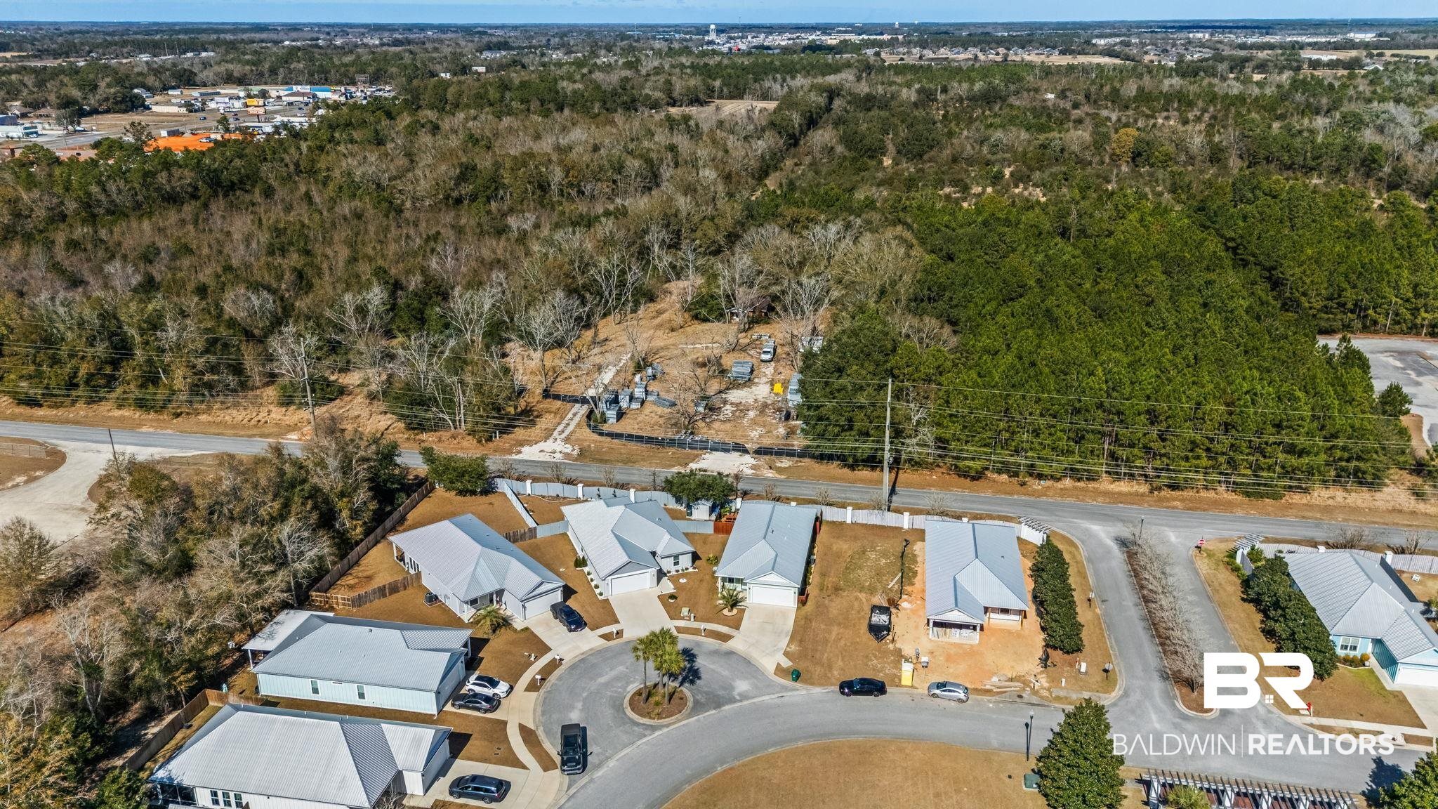 8013 Carmel Circle Foley, AL 36535 - Photo 42 of 49 Aerial view of property's location featuring nearby suburban area