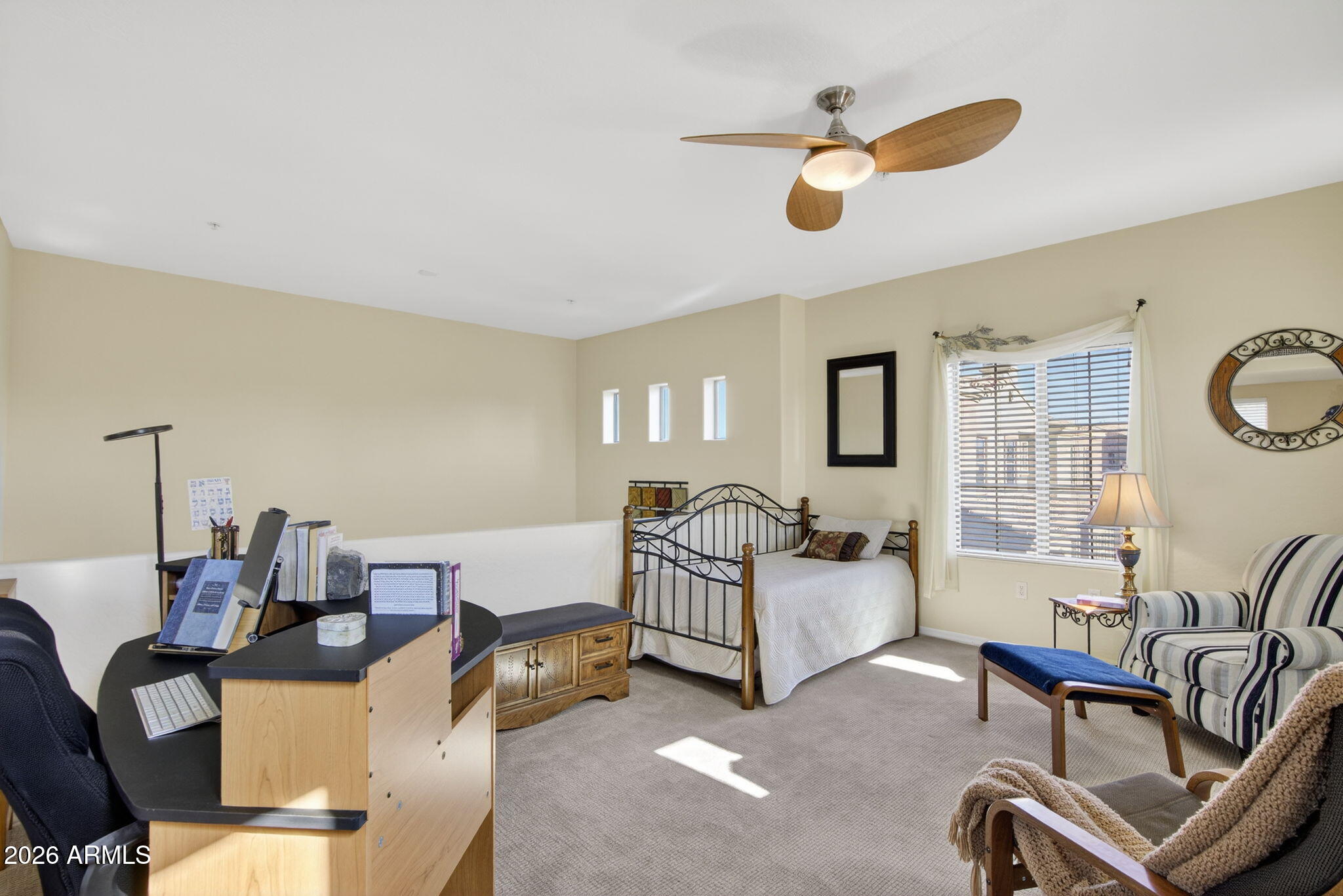 3935 East Rough Rider Road, Unit 1145 Phoenix, AZ 85050 - Photo 17 of 32 a living room with furniture