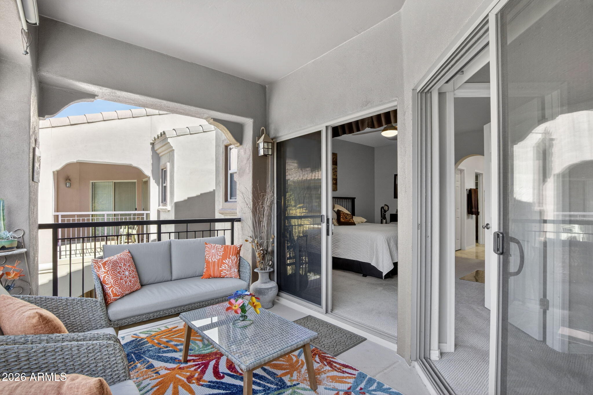 3935 East Rough Rider Road, Unit 1145 Phoenix, AZ 85050 - Photo 22 of 32 a living room with furniture and a window