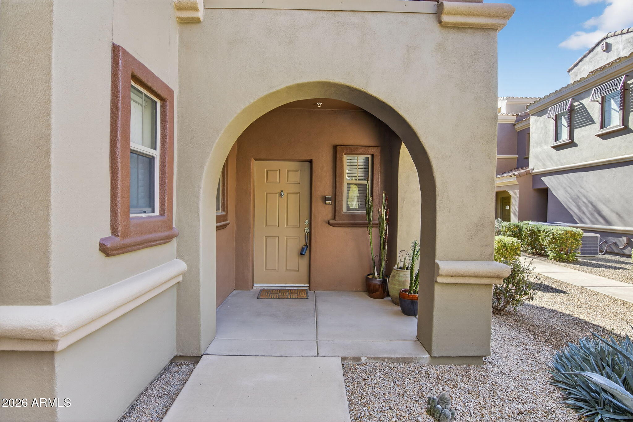 3935 East Rough Rider Road, Unit 1145 Phoenix, AZ 85050 - Photo 23 of 32 a view of hall way with furniture