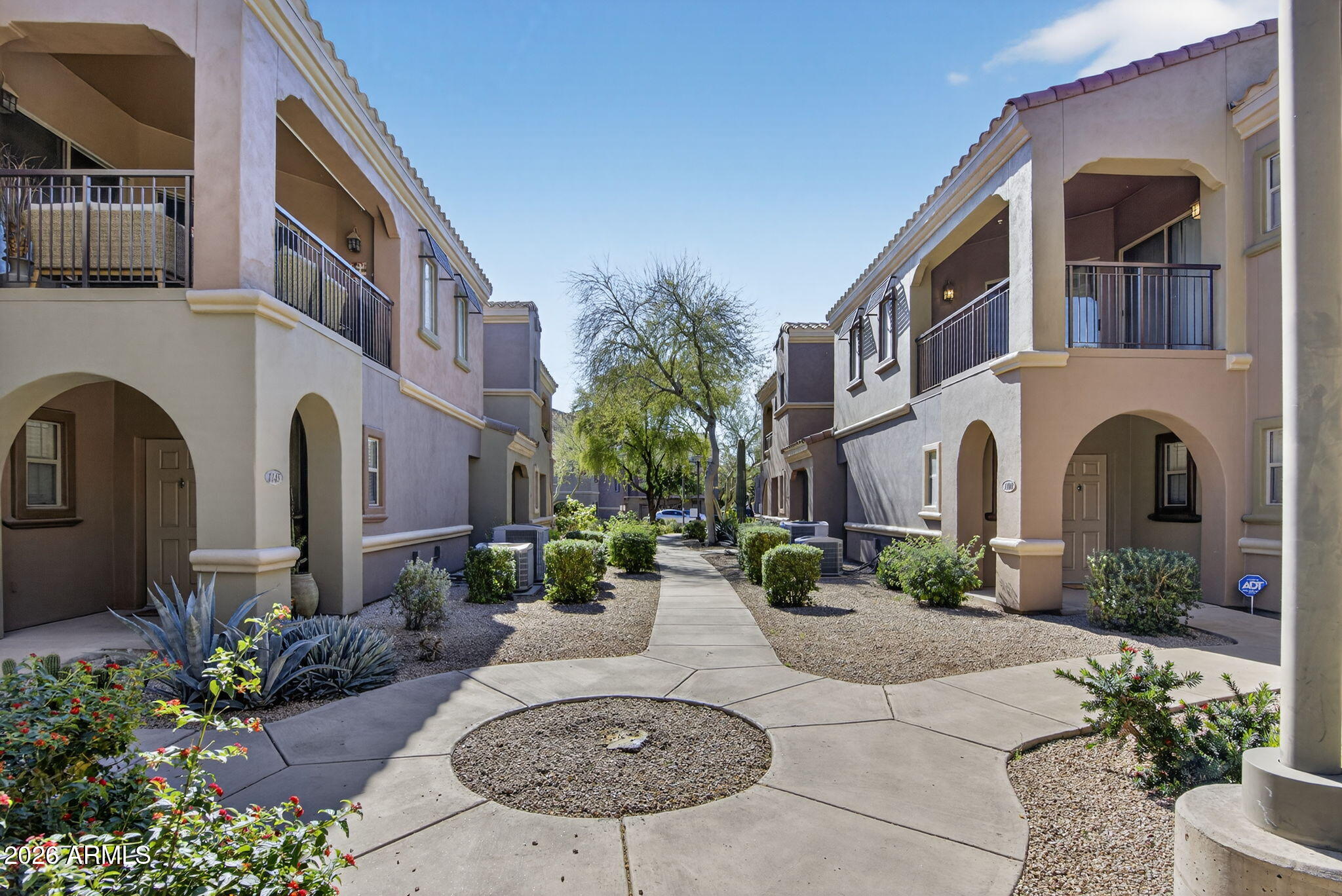 3935 East Rough Rider Road, Unit 1145 Phoenix, AZ 85050 - Photo 28 of 32 a house view with a outdoor space