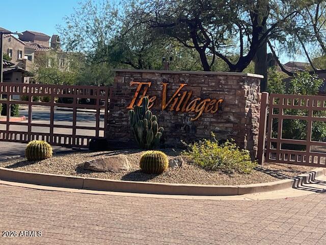 3935 East Rough Rider Road, Unit 1145 Phoenix, AZ 85050 - Photo 29 of 32 a view of outdoor space and car parked