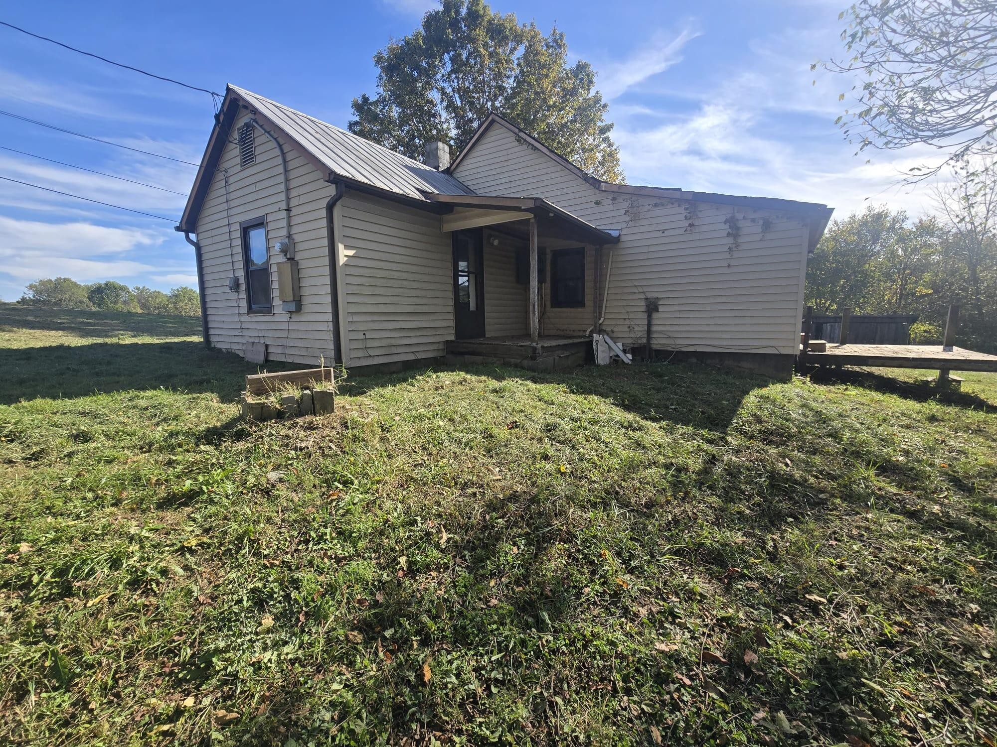 1596 Volunteer Road Rutledge, TN 37861 - Photo 18 of 25 a backyard of a house with lots of green space
