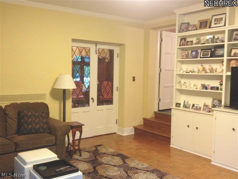 2184 Ridgewood Road Akron, OH 44313 - Photo 9 of 21 Family room with leaded glass doors to living room