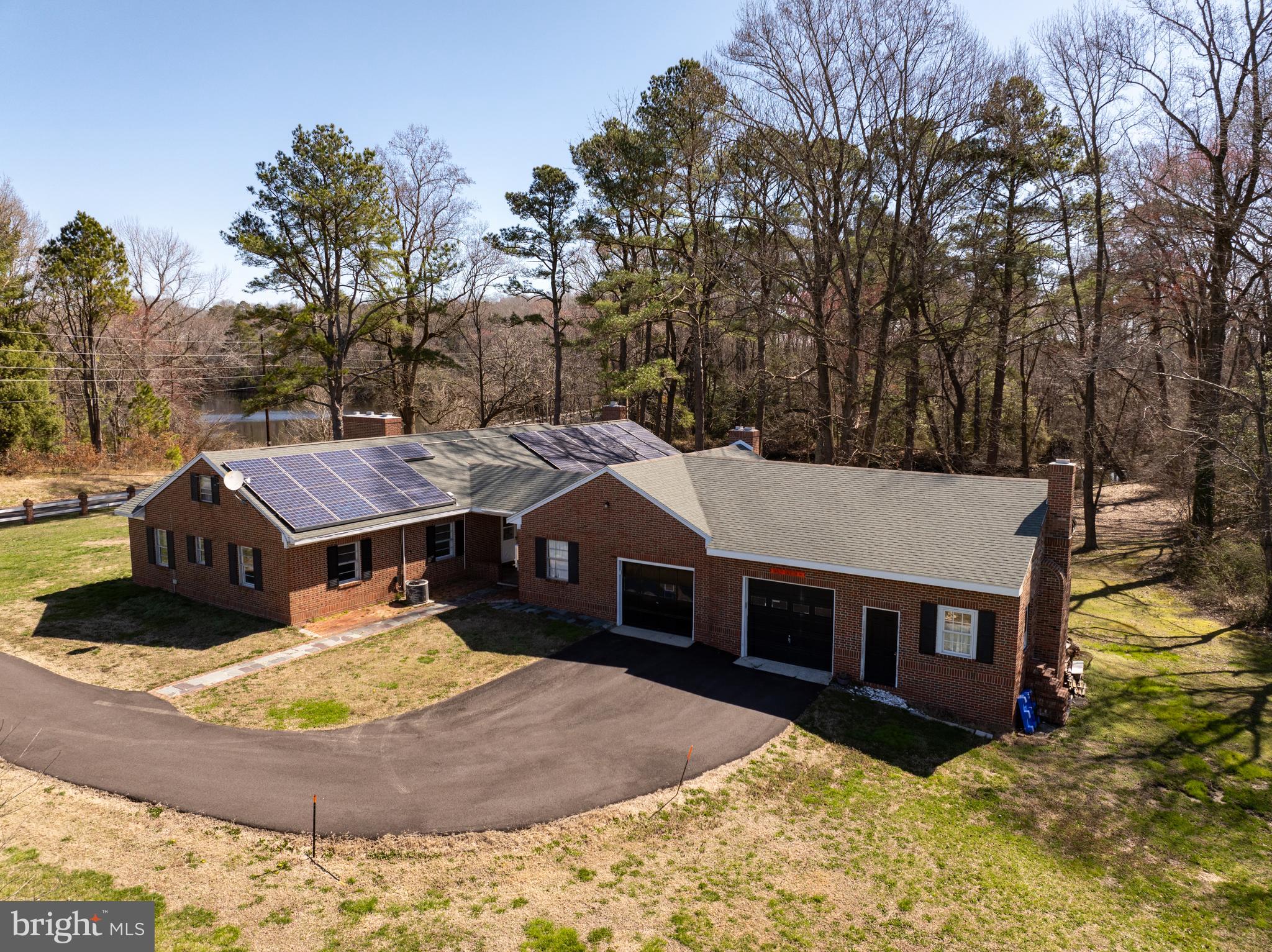 7890 Athol Road Hebron, MD 21830 - Photo 5 of 43 a view of a house with a yard