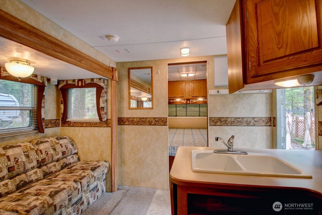 61 Christmas Tree Circle Maple Falls, WA 98266 - Photo 11 of 34 a bathroom with a sink and a mirror