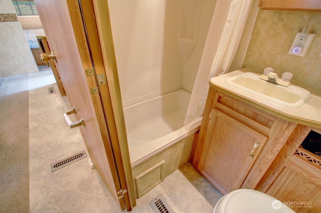 61 Christmas Tree Circle Maple Falls, WA 98266 - Photo 14 of 34 a bathroom with sink and mirror
