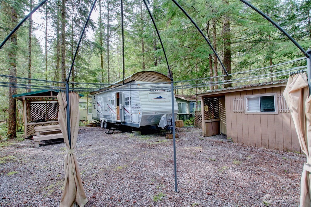 61 Christmas Tree Circle Maple Falls, WA 98266 - Photo 20 of 34 a view of a house with a yard and furniture