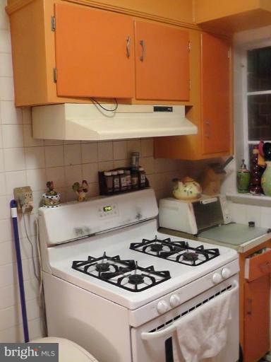 12106 Goodhill Road Silver Spring, MD 20902 - Photo 6 of 18 a kitchen with a stove and a sink