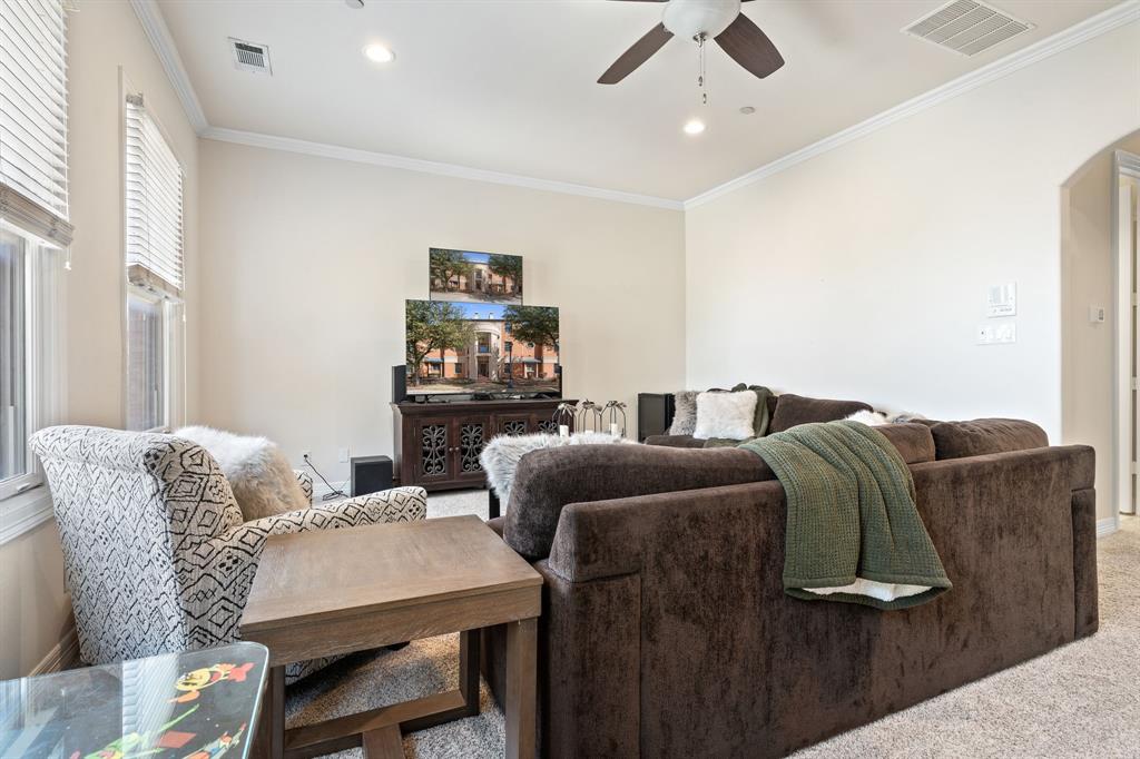 8444 Library Street Frisco, TX 75034 - Photo 15 of 36 a living room with furniture and a rug