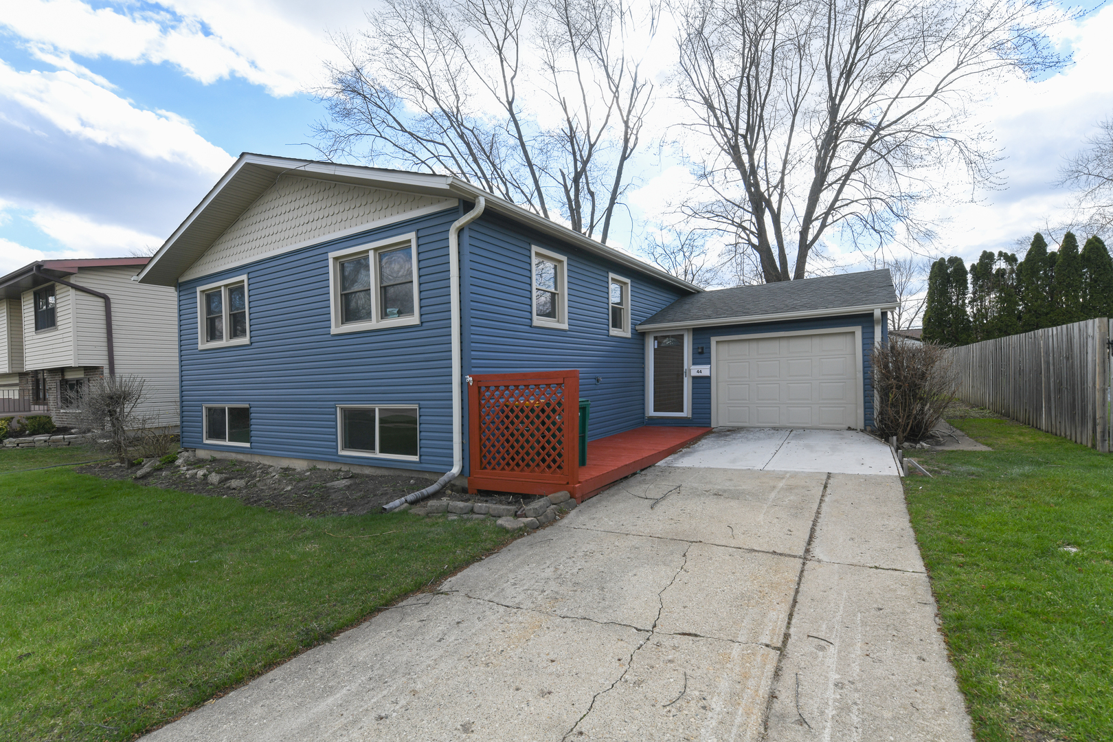 44 Redwood Trail Wheeling, IL 60090 - Photo 1 of 18 a front view of house with yard and green space