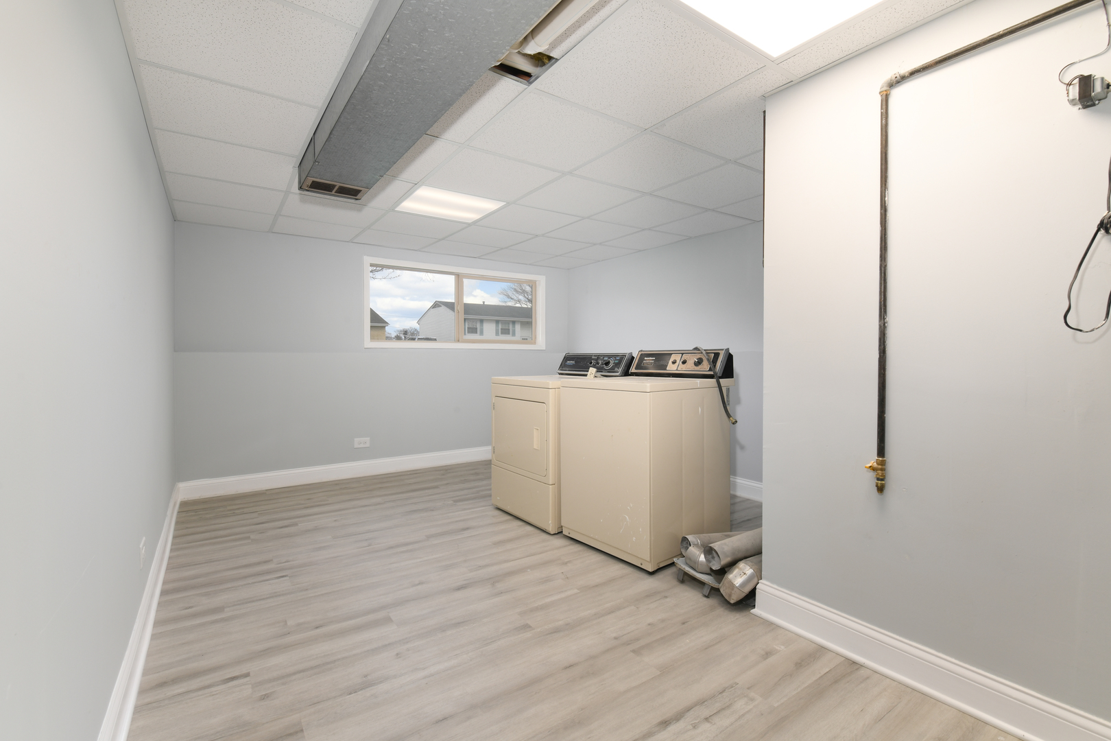 44 Redwood Trail Wheeling, IL 60090 - Photo 16 of 18 a view of a kitchen with wooden floor
