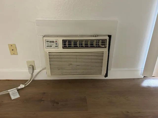 a view of a livingroom with wooden floor