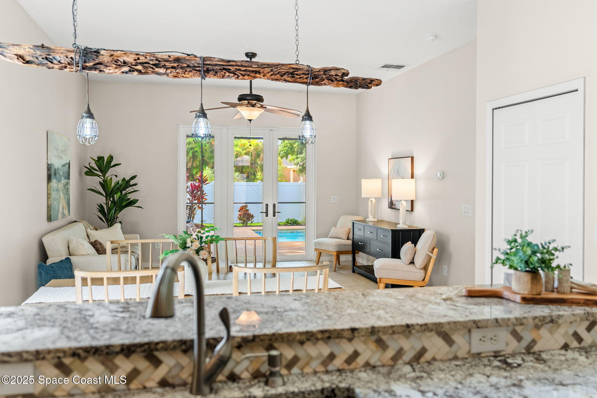 1908 Tullagee Avenue Melbourne, FL 32940 - Photo 14 of 58 a view of a living room and wooden floor