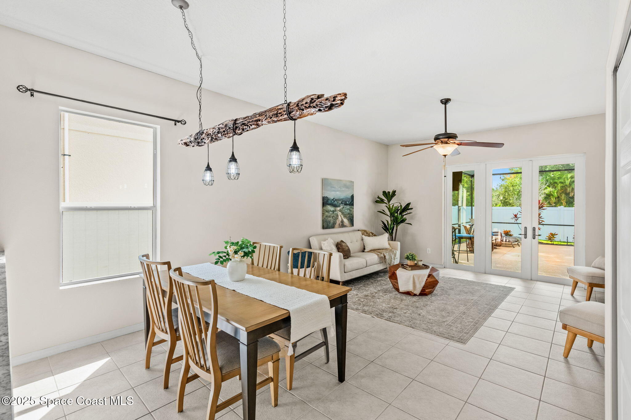 1908 Tullagee Avenue Melbourne, FL 32940 - Photo 15 of 58 a dining room with furniture and window