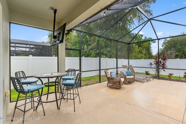 a view of house with a garden