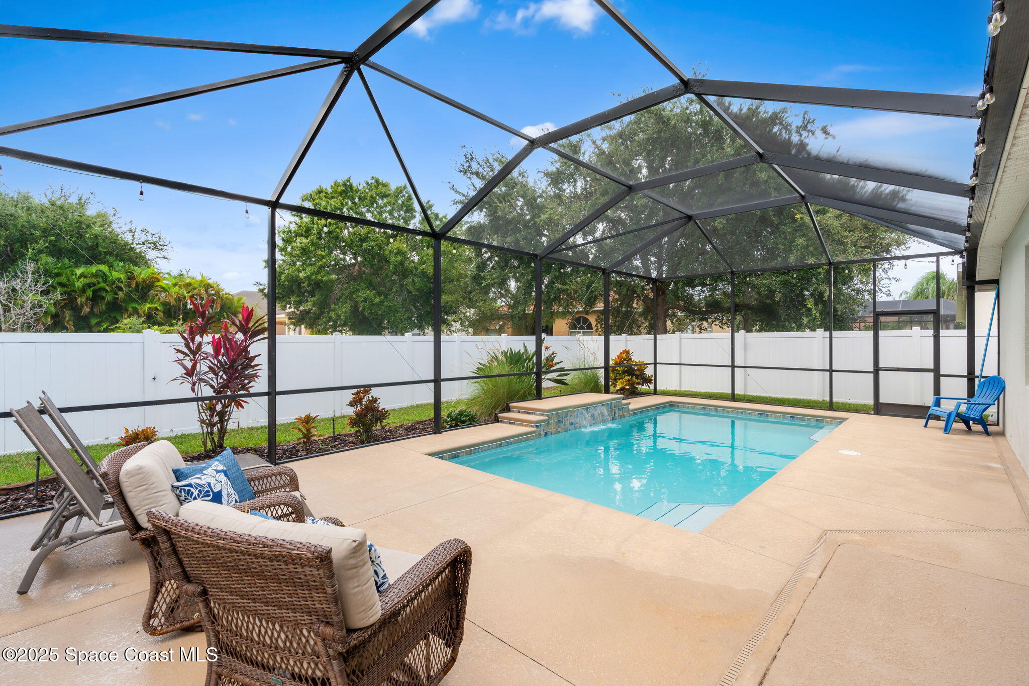 1908 Tullagee Avenue Melbourne, FL 32940 - Photo 33 of 58 a view of a swimming pool with a patio