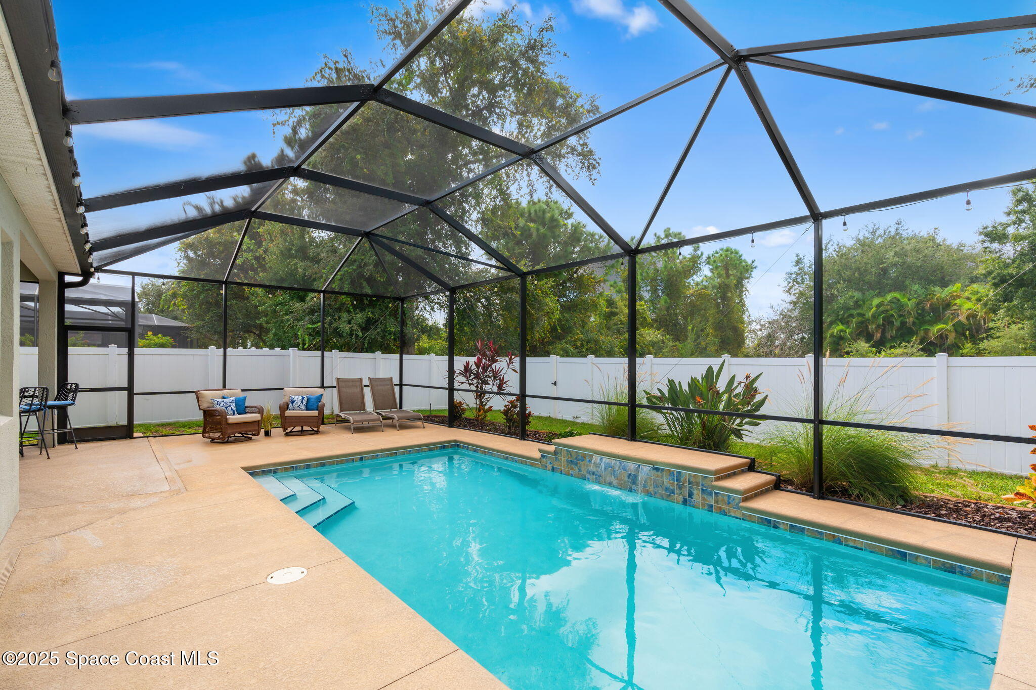 1908 Tullagee Avenue Melbourne, FL 32940 - Photo 36 of 58 a view of a swimming pool with a patio