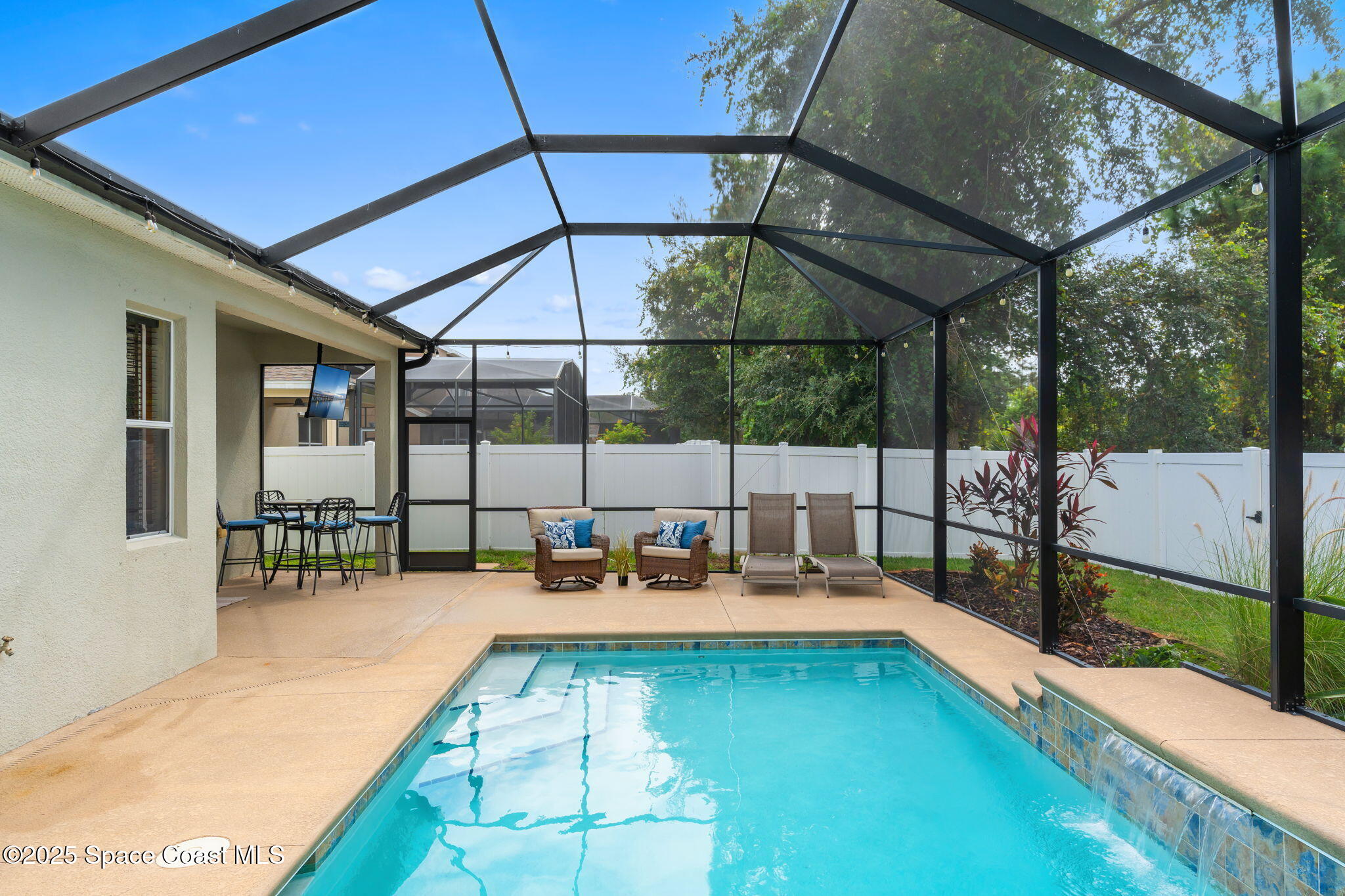 1908 Tullagee Avenue Melbourne, FL 32940 - Photo 37 of 58 a view of a swimming pool with a patio