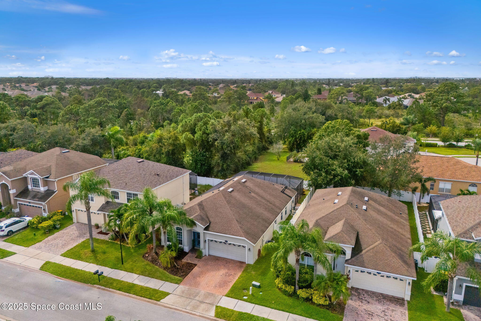 1908 Tullagee Avenue Melbourne, FL 32940 - Photo 40 of 58 an aerial view of multiple house