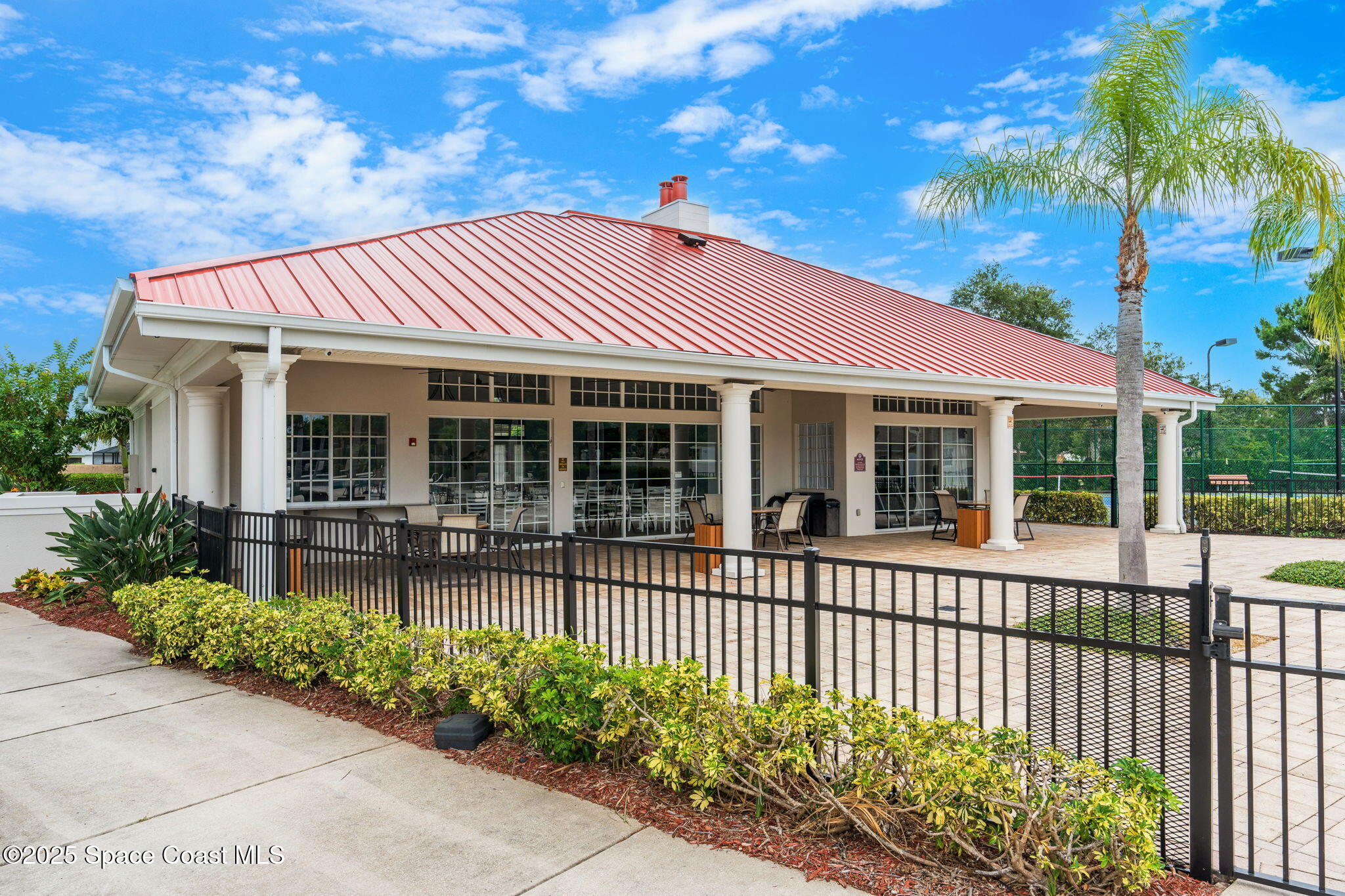 1908 Tullagee Avenue Melbourne, FL 32940 - Photo 45 of 58 a front view of a house with a garden