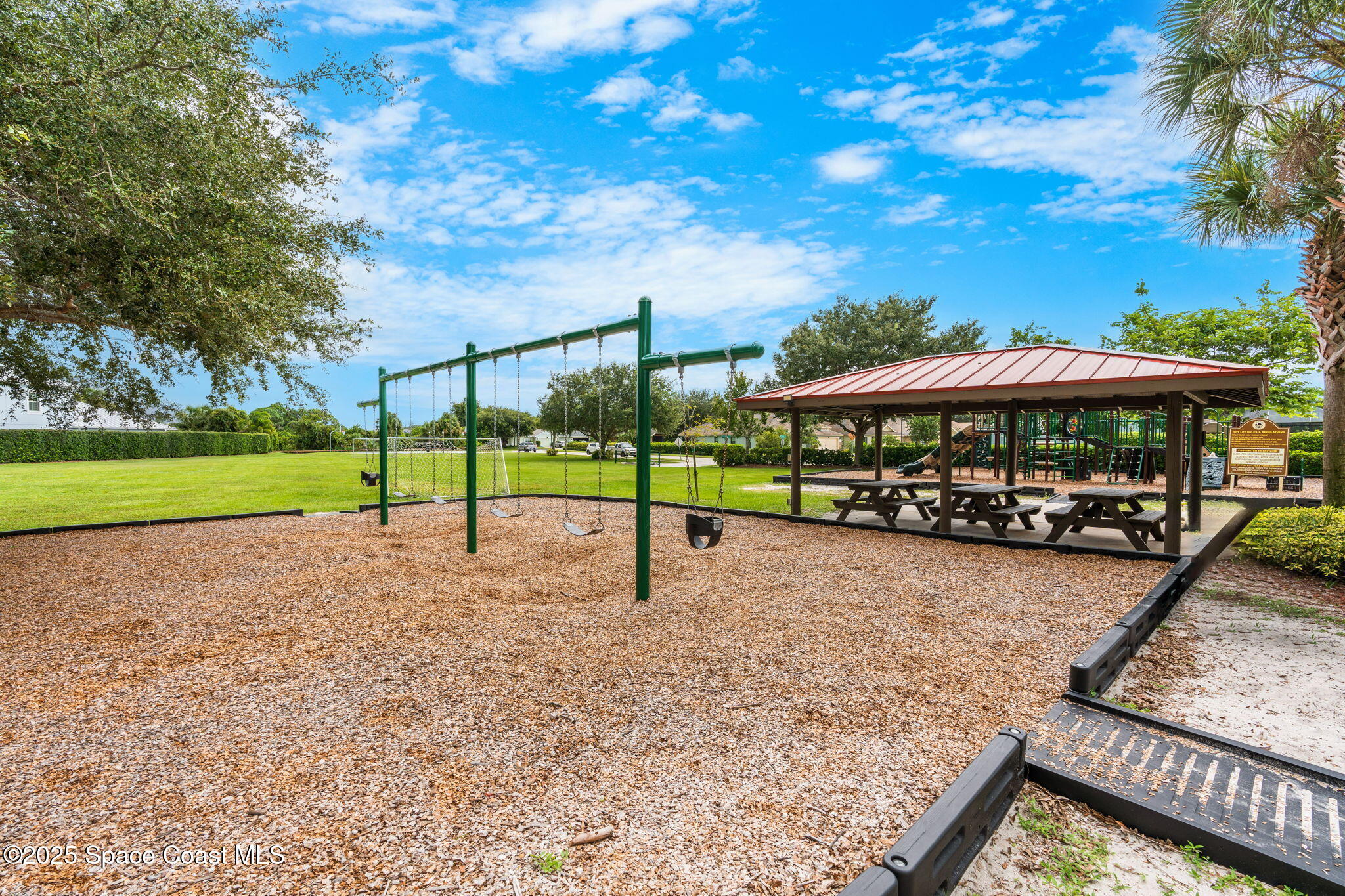 1908 Tullagee Avenue Melbourne, FL 32940 - Photo 55 of 58 a view of a house with backyard and sitting area