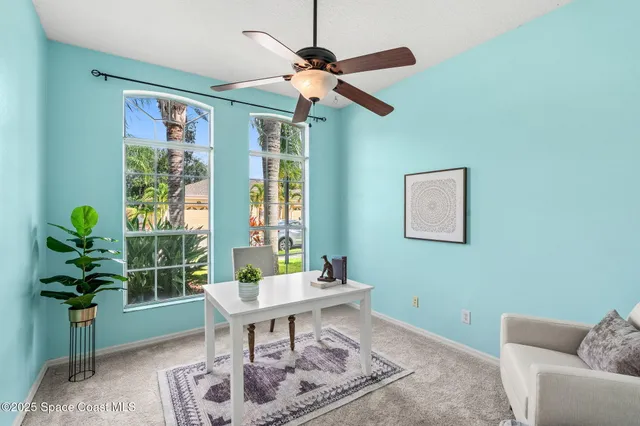 a kitchen with stainless steel appliances granite countertop a refrigerator sink and stove